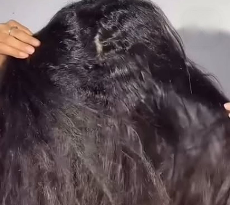 Cabelo escuro com brilho após tratamento